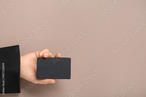 Female hand with blank busi...