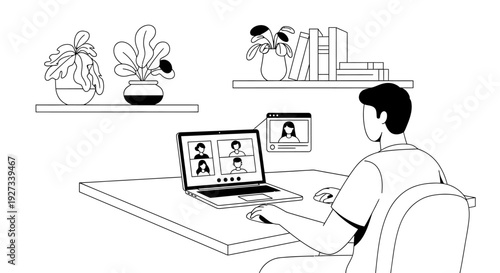 Young man participates in a video conference call using a laptop computer while seated at a desk surrounded by houseplants and shelving units in a home office setting.