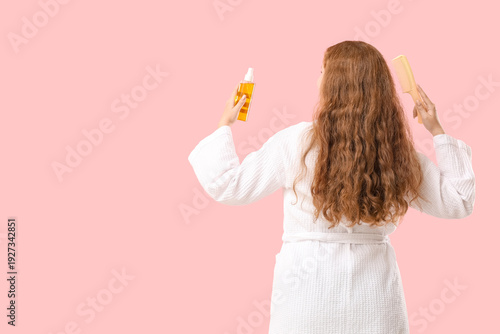 Young redhead woman with ha...