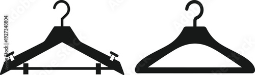 Two black plastic coat hangers with hook and clips for hanging clothes