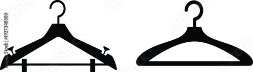 Two black silhouette clothing hangers on a for fashion or organization concepts