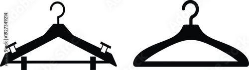 Two black silhouette clothing hangers with and without clips on pure for fashion or organization concepts