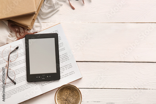 Modern e-reader with books,...