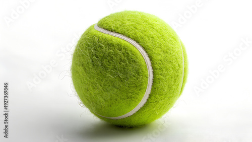 Green Tennis ball on isolated white background also used in cricket