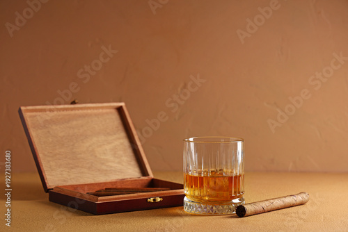 Glass of cold rum and case ...