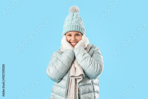 Happy young woman in winter...