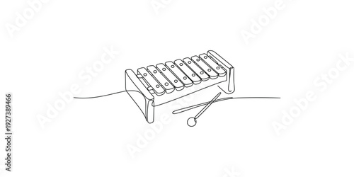 A simple black and white line art illustration of a small toy xylophone and mallet