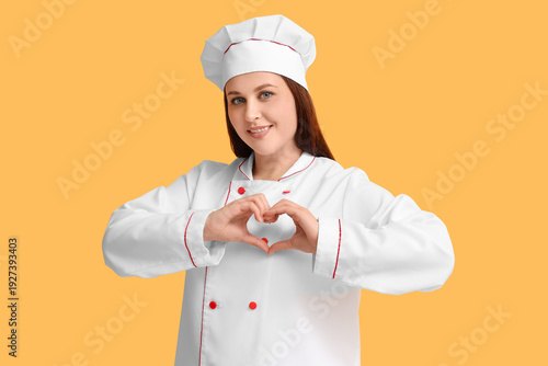 Young female chef making he...