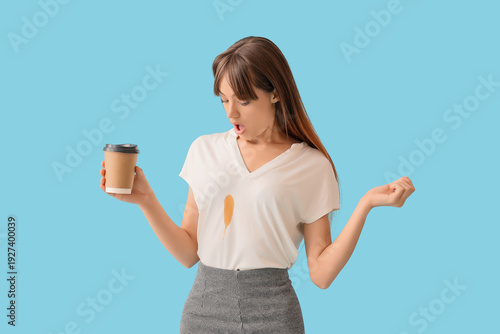 Young woman with cup of cof...