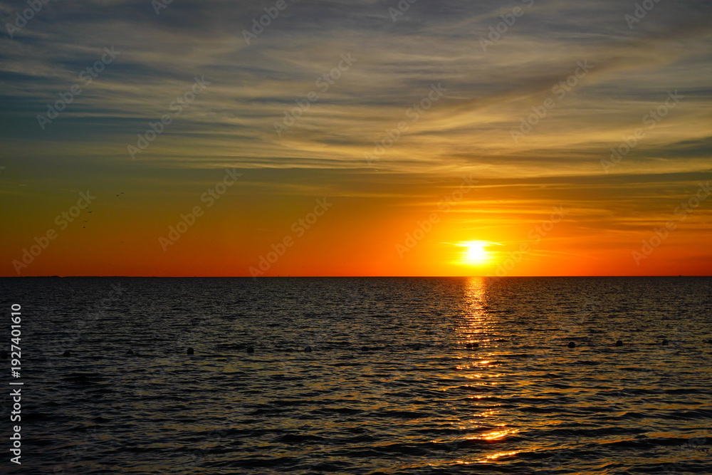 Obraz premium The sun set landscape of gulf of America and Port Richey in Florida