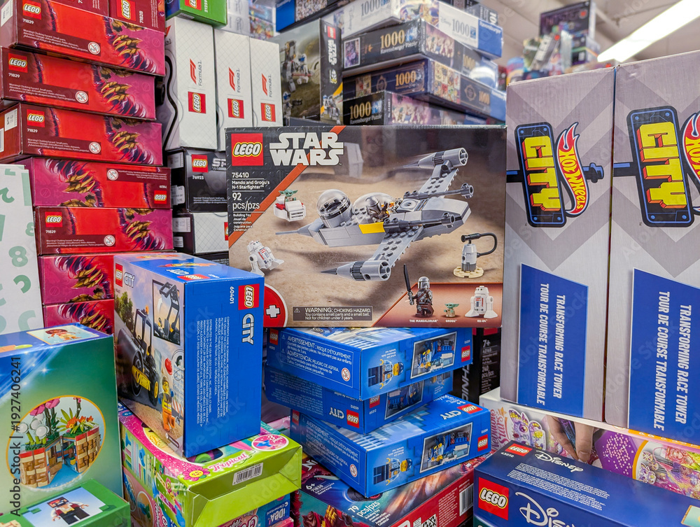 Obraz premium Canada, Montreal, 22 December 2025 : Lego Star Wars set surrounded by various colorful toy boxes