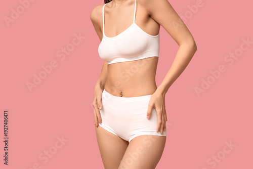 Young woman in underwear on...