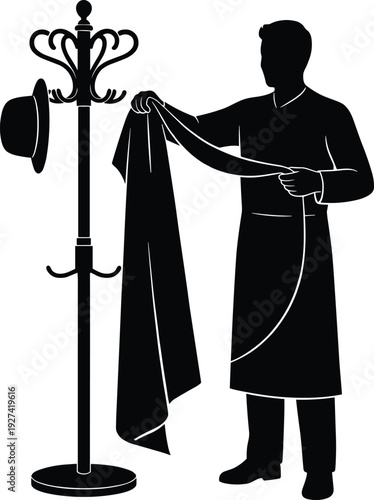 Black silhouette of a professional male tailor or butler holding a fabric coat next to a vintage hat stand for fashion service and hospitality design