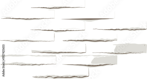 Torn paper edges layered on top of each other in a messy and chaotic arrangement