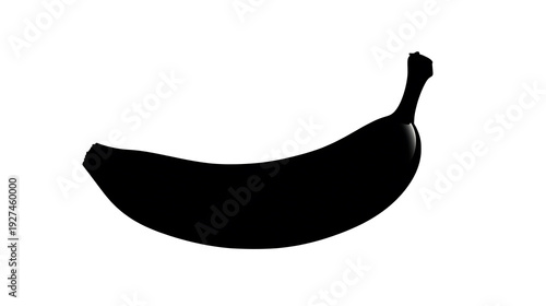 A dark and mysterious banana silhouette, ready for a taste. Its graceful curve and shape hint at sweetness