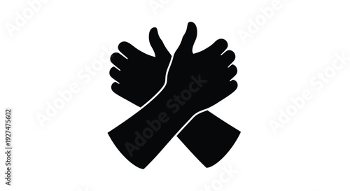 Two hands forming a thumbs up gesture in a crossed position