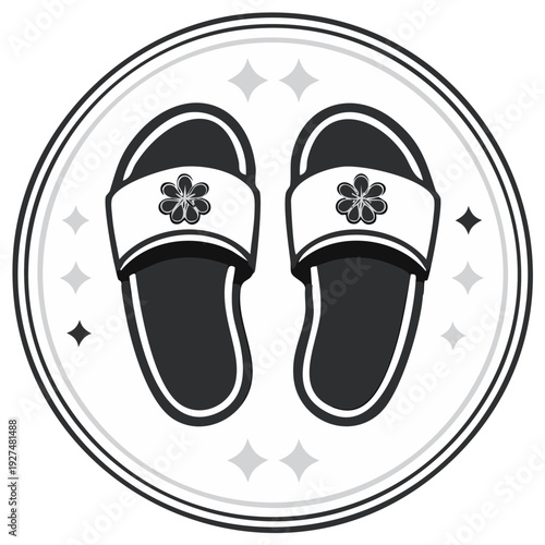 Simple black and white icon of two open toe sandals decorated with flowers inside a circular frame