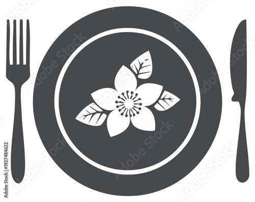 Elegant dining setting showcasing floral design, accompanied by utensils and an artistic touch