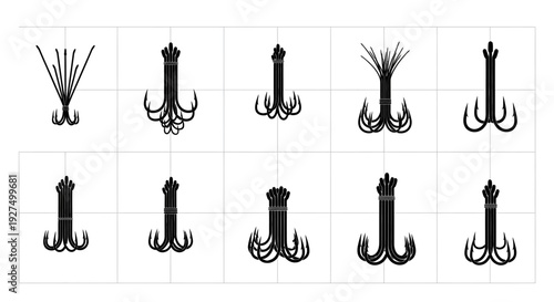 Assorted fishing hooks with feathers and threads on white background for angling and fishing gear