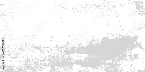 A vintage gray concrete wall featuring a rough stone texture and dirty grunge paint effects creates an old paper pattern for a grungy retro backdrop design