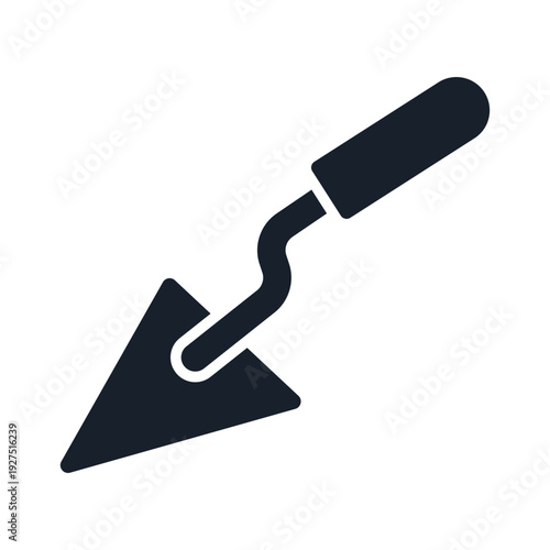 A dark silhouette of a trowel on a white background