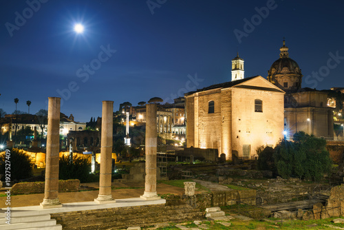 Roman forum ruins at night in Rome, Italy