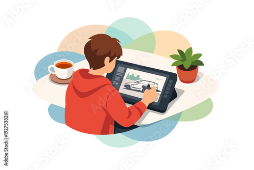 Young man drawing on a digital tablet with a stylus pen.