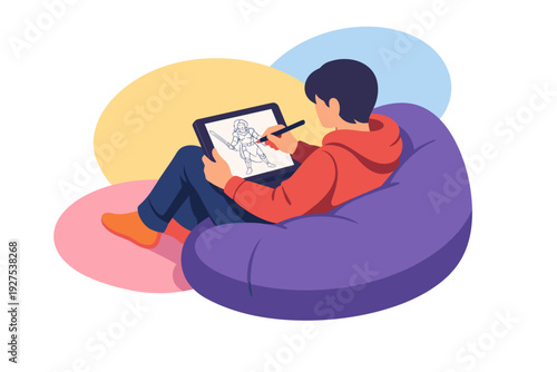 Young person drawing on a digital tablet while sitting on a beanbag chair.