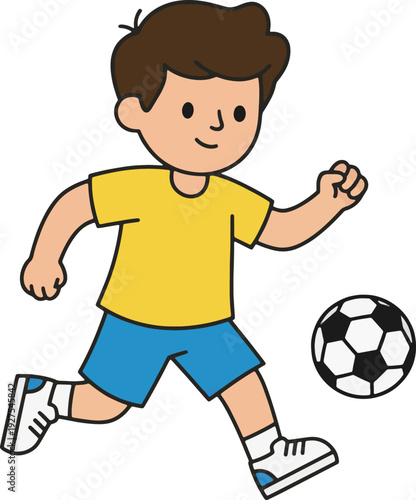 happy young boy playing soccer and kicking a ball