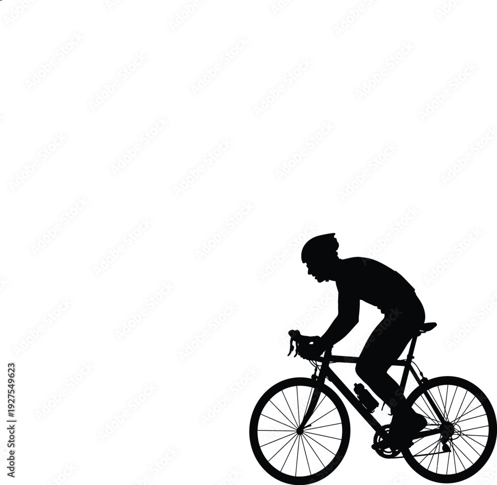 Obraz premium Silhouette of a cyclist riding a bicycle