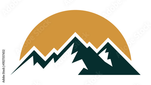 Silhouette of mountains with a rising sun behind their peaks