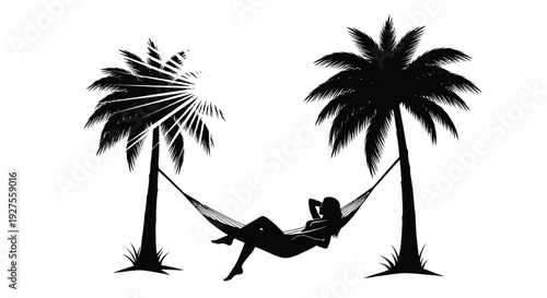Relaxing silhouette of a person in a hammock between two palm trees against a bright sun