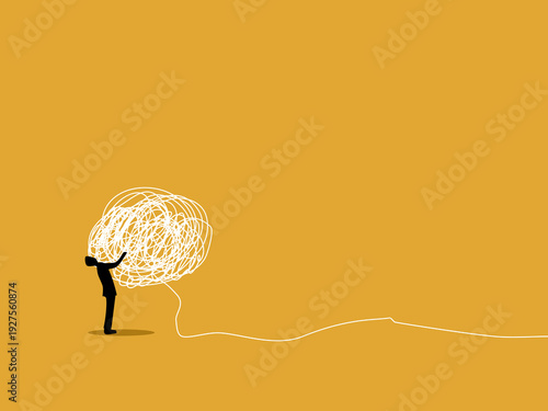  businessman was trying to untangle a very tangled mess of ropes.