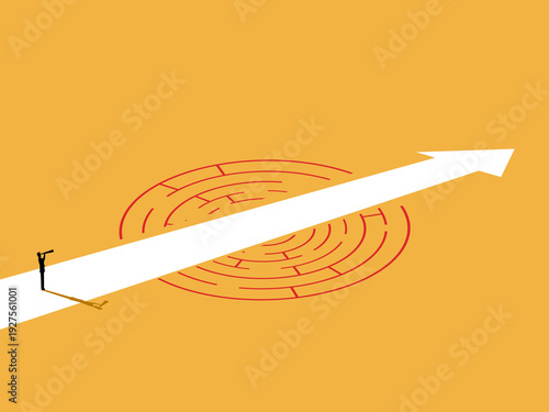 businessman looked at the arrow pointing the way through the maze