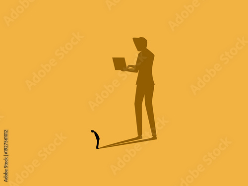businessman with his own shadow working on a laptop