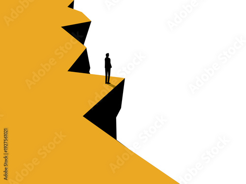 confident businessman stands on the edge of a high cliff.