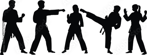 Karate martial arts silhouettes in fighting poses, men and woman black vector set isolated on white background illustration