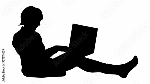 Casual woman working on laptop in relaxed pose