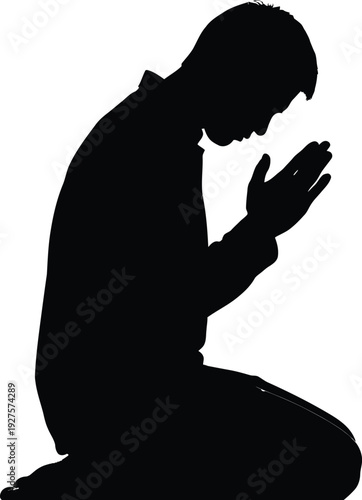 A muslim in prayer silhouette