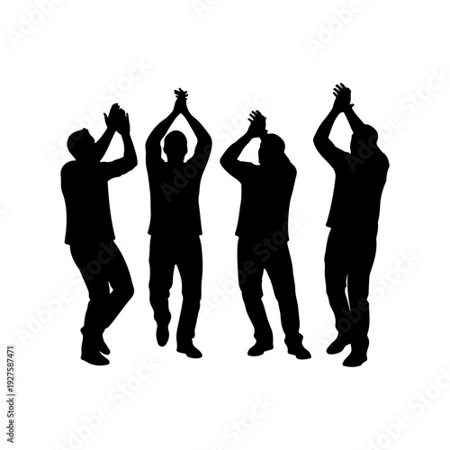 Silhouette of four men clapping hands in celebration.