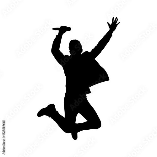 Silhouette of a man jumping with a microphone.