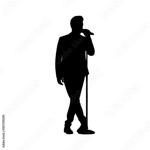 Silhouette of a Male Singer Performing on Stage with Microphone.