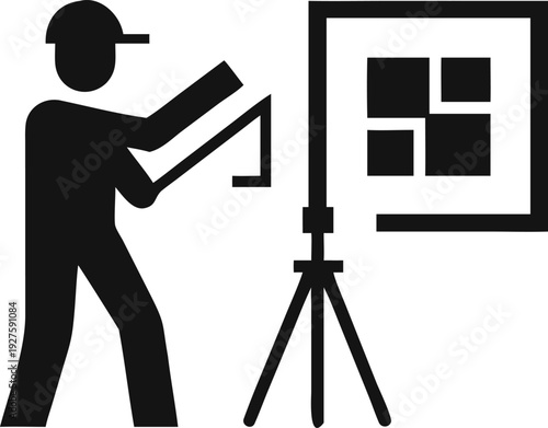 Event technician setting up a display screen with multiple panels on a tripod stand