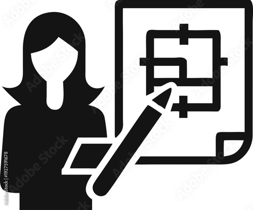 Female architect or designer reviewing a construction plan with a pencil in hand