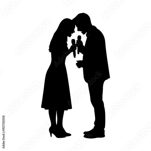 Silhouette of a couple holding microphones, possibly singing or performing.