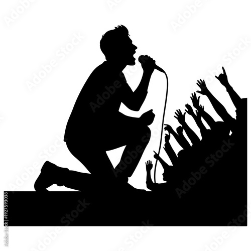 Silhouette of a Singer Performing on Stage with an Excited Crowd.