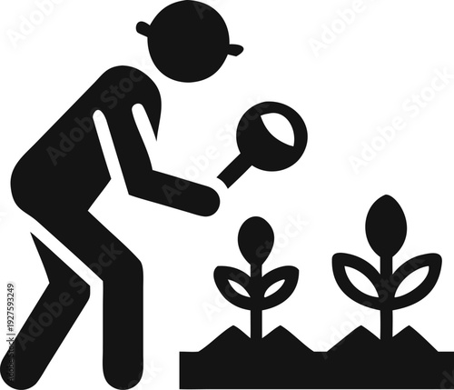 Dedicated scientist observing tiny plant sprouts in the earth with a powerful magnifying glass