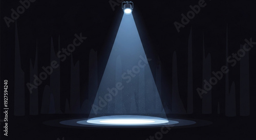 Spotlight shines brightly in dark room with focused beam of light on circular stage floor