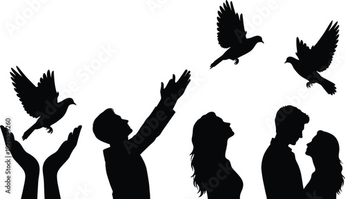 Black silhouettes of people releasing birds into the air hands release
