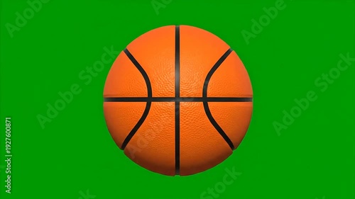 Close-up of basketball on green screen
